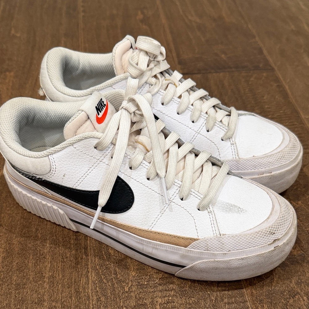 Nike women’s  White and Black Sneakers with Tan Accents